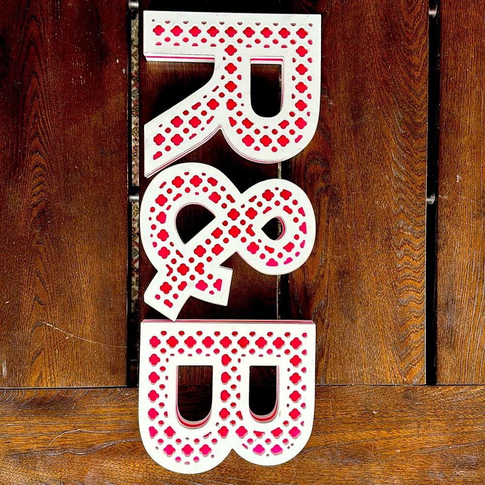 Letters R B and syntax sign &.